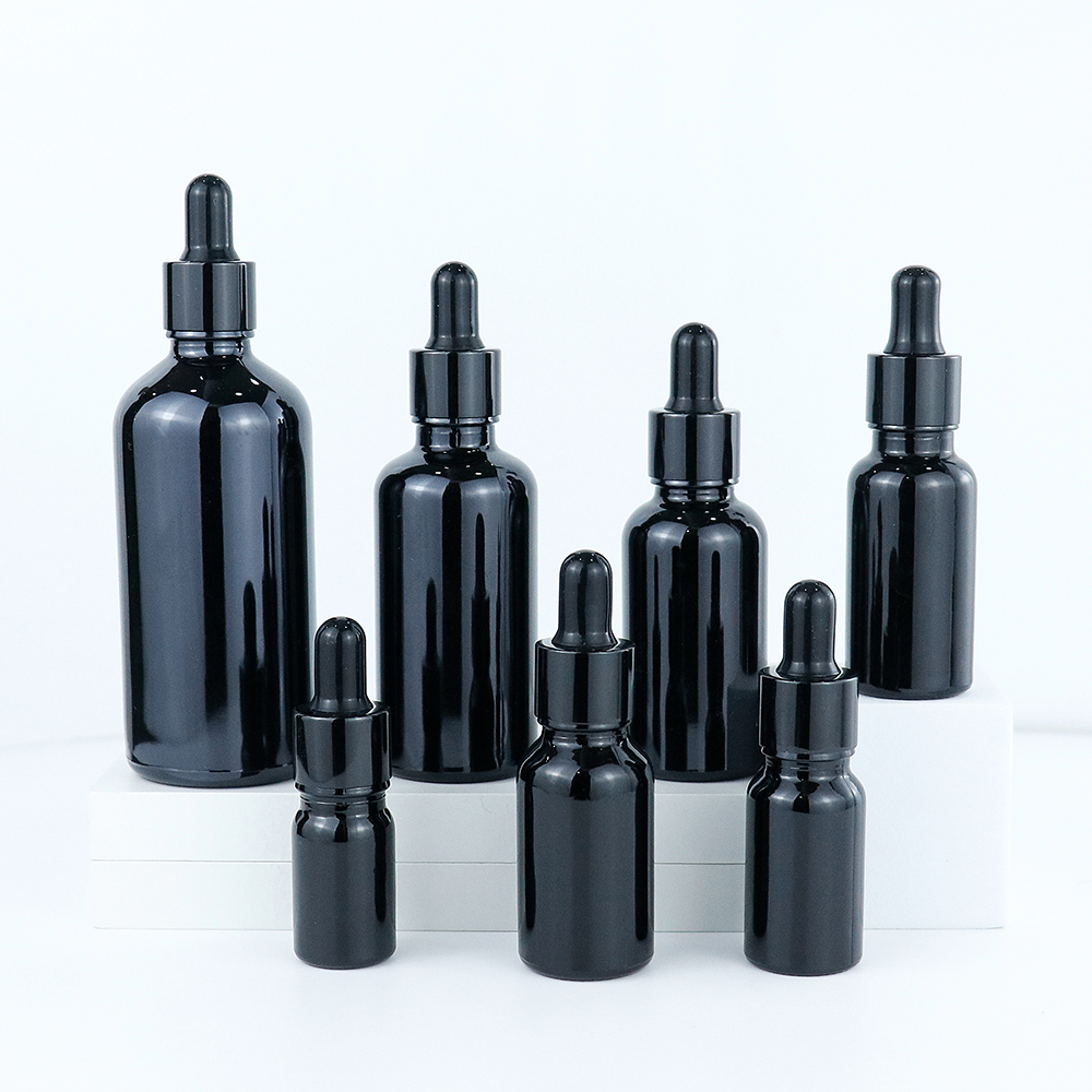 black essential oil bottle